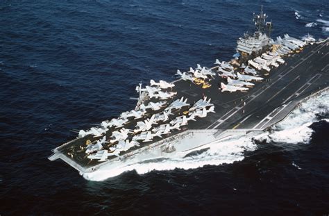 A Port Quarter View Of The Aircraft Carrier Uss John F Kennedy Cv 67 Conducting High Speed