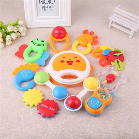 Cute Baby Early Educational Hand Rattle Music Sound Appease Toys Intelligence Grasping Gums Hand