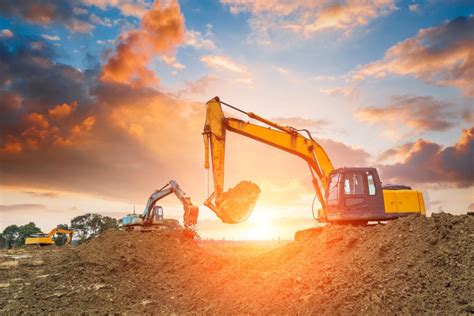 Excavator Working On A Construction Site Heavy Duty Construction Equipment At Work Stock