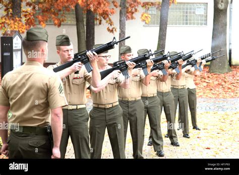 File A U S Marine Corps Rifle Detail With Marine Corps Forces Europe And Marine Corps Forces Africa Fire Three Volleys During A Memorial Ceremony In Stuttgart Germany Oct 23 2013 Held To Commemorate