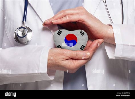 Korean Doctor Holding Heart With Flag Of South Korea Background Healthcare Charity Insurance