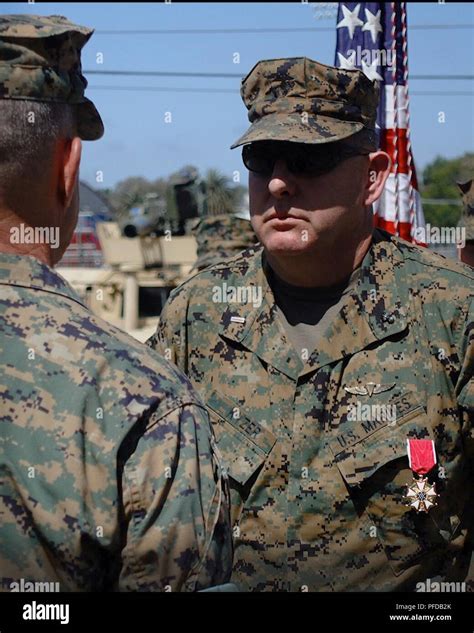 U S Marine Corps Chief Warrant Officer 5 Vincent Kyzer The 1St Marine Division Gunner Is Awarded The Legion Of Merit Medal During His Retirement Ceremony At Marine Corps Base Camp Pendleton Calif